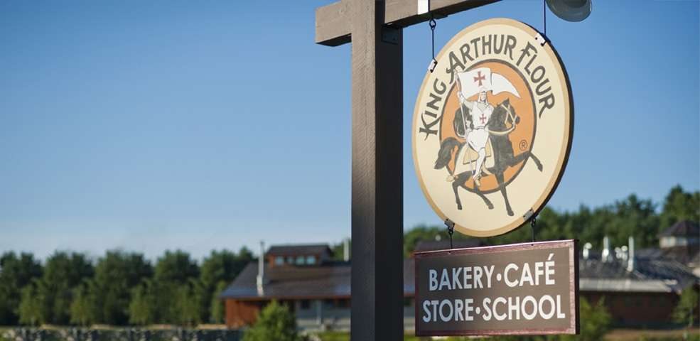 The sign for King Arthur Flour's bakery, cafe, store and school.